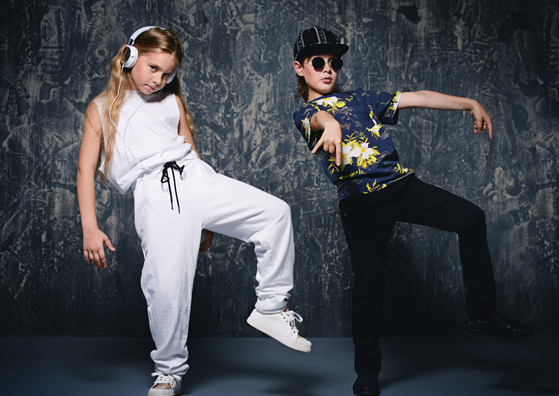 Two,Cool,Modern,Kids,Posing,Together,In,Hip-hop,Style,Clothes.